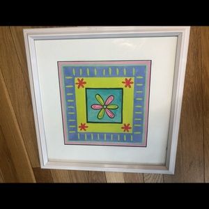 Framed picture of a drawn flower